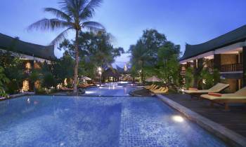 a pool next to a tree