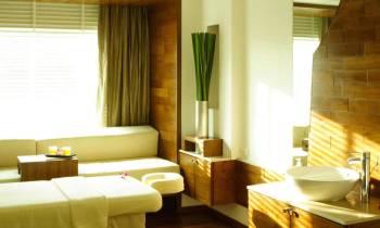 a living room filled with furniture and a large window