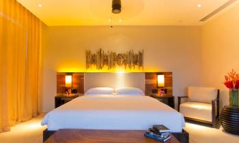 a bedroom with a bed in a hotel room