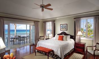 a bedroom with a large bed in a hotel room