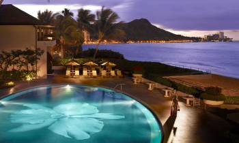 a pool next to a body of water