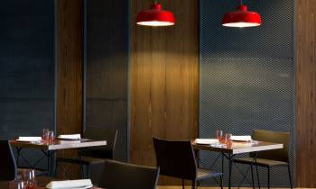 a large red chair in a room