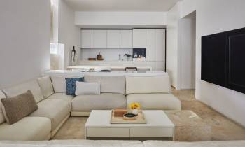 a living room with white walls