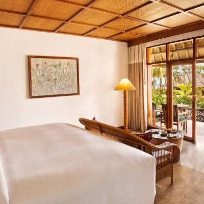 a living room filled with furniture and a large window