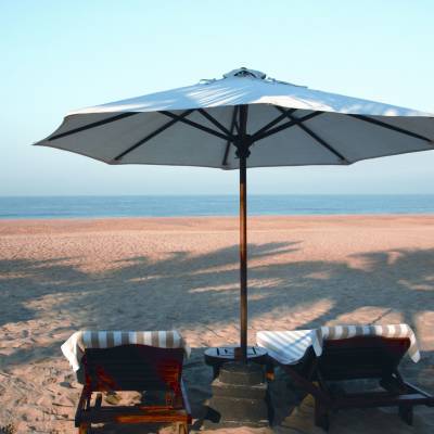 a close up of an umbrella on a beach