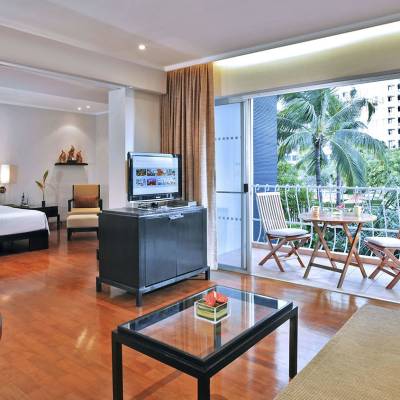 a living room filled with furniture and a large window