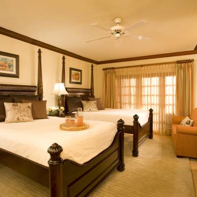 a bedroom with a large bed in a room
