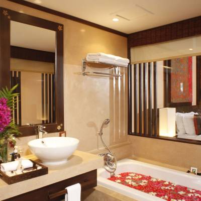 a double sink and large mirror