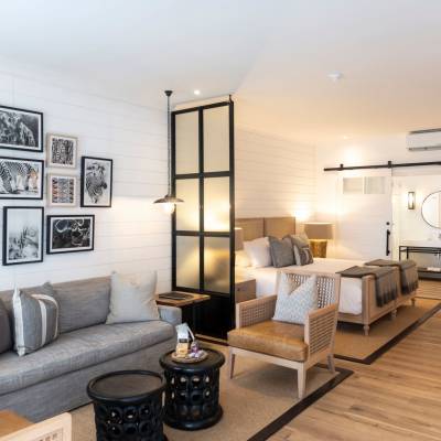 a living room filled with furniture and a fire place