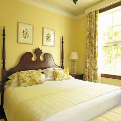 a bedroom with a bed in a hotel room