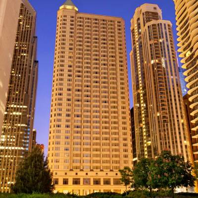 a view of a city with tall buildings in the background