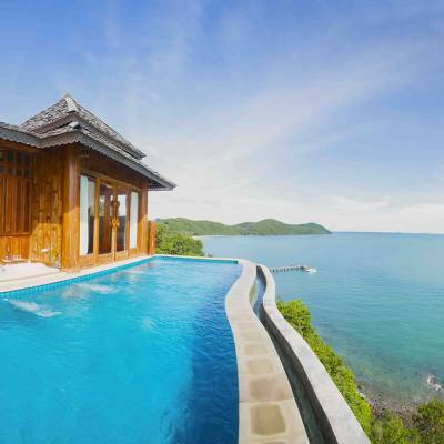 a pool next to a body of water