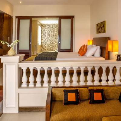 a bedroom with a large mirror