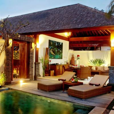 a living area with a building in the background