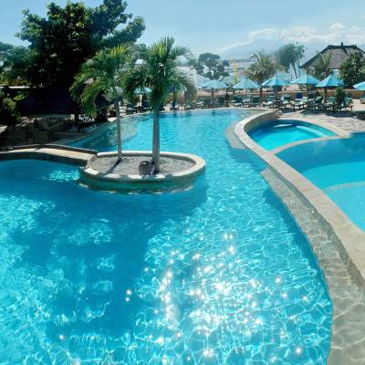 a pool next to a body of water