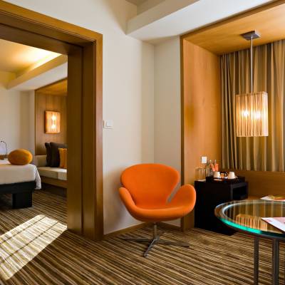 a hotel room with a large mirror