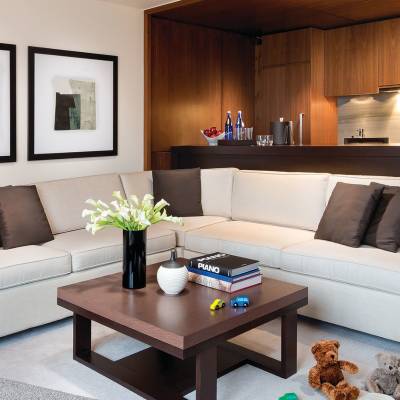 a modern living room with a couch and a table