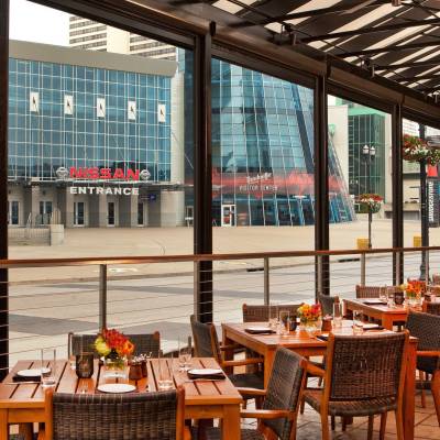a dining room table in front of a building