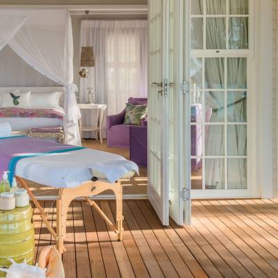 a bedroom with a large window