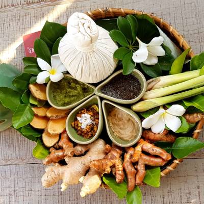 a plate of food with a green salad