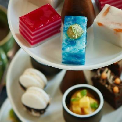 a close up of a plate of food and a cup of coffee
