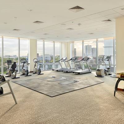 a room filled with furniture and a large window