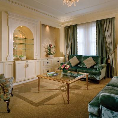 a living room filled with furniture and a large window
