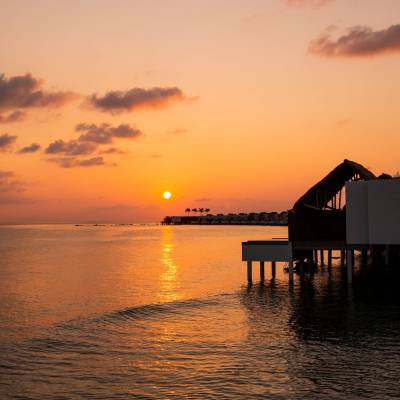 a sunset over a body of water