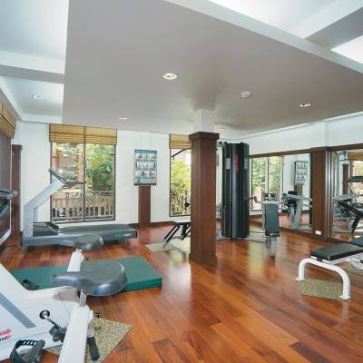 a living room filled with furniture and a large window