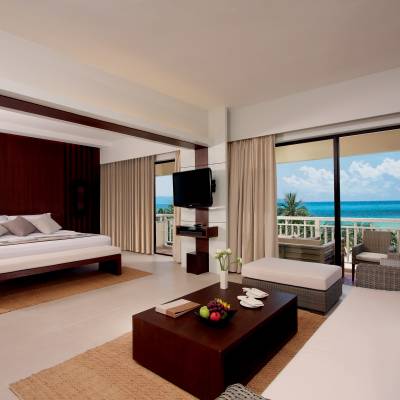 a room filled with furniture and a large window