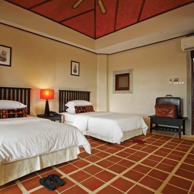 a bedroom with a bed in a hotel room