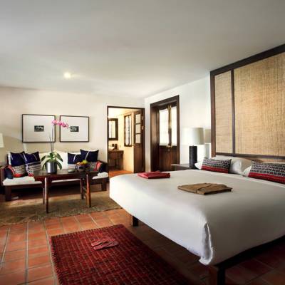 a bedroom with a large bed in a room