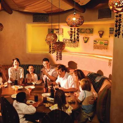 a group of people sitting at a table