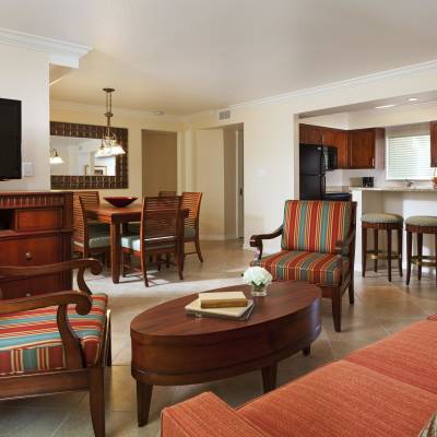 a living room filled with furniture and a fireplace