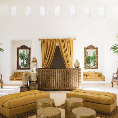 a living room filled with furniture and a fireplace