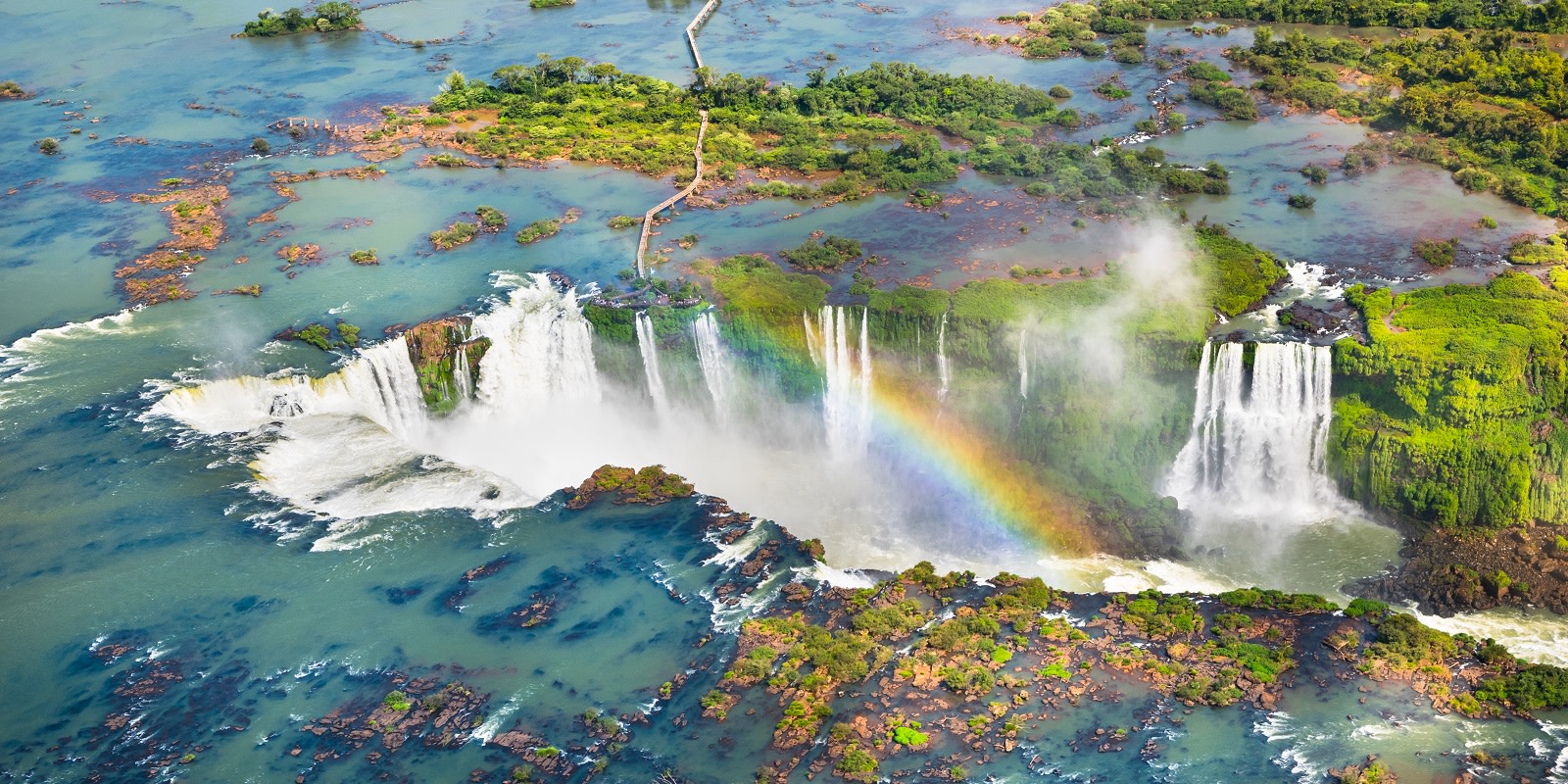 Beautiful aerial view of Iguazu Falls - One of the Seven Natural Wonders of the World - Foz do Iguaçu, Brazil Beautiful aerial view of Iguazu Falls - One of the Seven Natural Wonders of the World - Foz do Iguaçu, Brazil