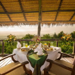 Set table at Four Seasons Tented Camp, Golden Triangle Hotel in Chiang Saen, Thailand