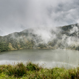 Lake inside Bisoke volcano crater, Virunga volcano national park, Rwanda