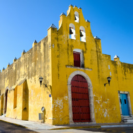 Yellow church and colonial architecture in Campeche, Mexico Tours
