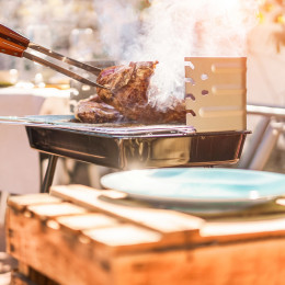 Enchanting Travels Australia Tours grill t-bone steak at barbecue dinner outdoor