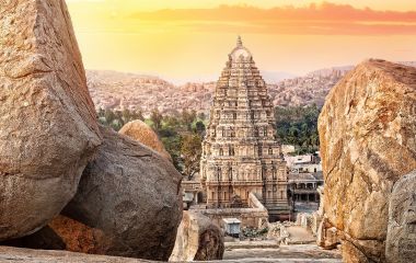 Virupaksha temple view from Hemakuta hill at sunset in Hampi, Karnataka, India