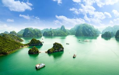 Enchanting Travels - Asia Tours-HALONG bay in vietnam. UNESCO World Heritage Site. This view from TiTop island and its most popular view for travel in Halong bay.