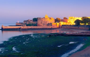Enchanting Travels India Tours Fort Diu at night. Daman and Diu, India Asia