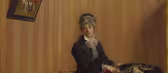 A woman in late 19th-century attire sits in a room with striped wallpaper. She holds a book and is surrounded by travel trunks and clothing. A picture hangs askew on the wall. The scene conveys a sense of travel or transition.