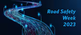Abstract illustration of a winding road made of blue, glowing lines and surrounded by curved streetlights against a dark background. The text "Road Safety Week 2023" is written in blue on the right side of the image.