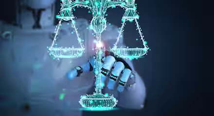 A robotic figure holds a glowing digital scale, symbolizing justice. The scales are made up of interconnected blue lights and lines, standing out against a dark background. The image represents the intersection of artificial intelligence and justice.