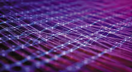 A close-up image depicting an abstract, interconnected network of glowing lines and nodes against a gradient background of purple, pink, and blue hues. The lines form a complex web, creating a futuristic and digital aesthetic.