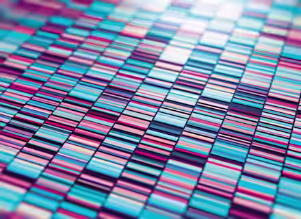 A colorful, abstract image featuring a grid of rectangular tiles. Each tile displays parallel lines in various shades of pink, blue, and turquoise, creating a dynamic, vibrant pattern. The image has a futuristic, digital feel.