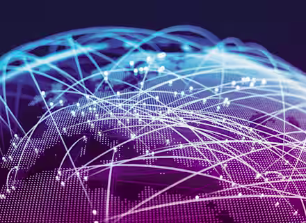 A digital representation of a globe with interconnected points emitting bright, glowing lines, symbolizing global communications and networking. The image features a vibrant mix of blue and purple hues, against a dark background.