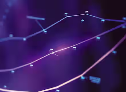 A close-up of a digital graph with intersecting lines and data points on a dark background. The lines are glowing in purple and blue hues, with labels and numbers indicating various data points. The overall aesthetic is futuristic and high-tech.